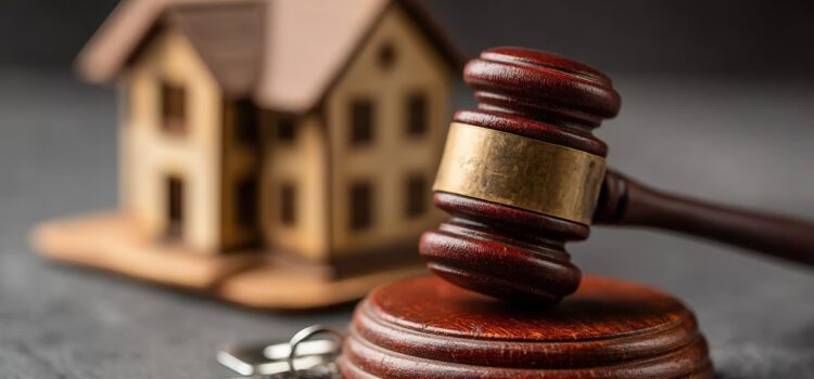 California Tenant Protection Act Rent control image of judges gavel in front of model house and keys