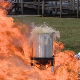 How to cook turkey in apartment safely - deep fried turkey on fire showing dangers banned in California rentals