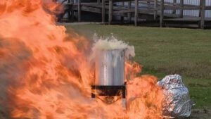 How to cook turkey in apartment safely - deep fried turkey on fire showing dangers banned in California rentals