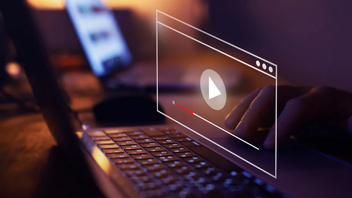 laptop streaming online videos about property management by All East Bay Properties